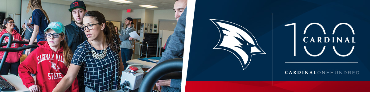 SVSU Cardinal 100 logo with a photo of a professor helping students in a lab